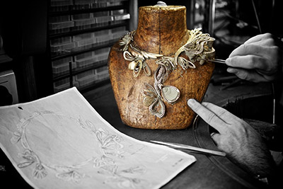 Working on Boucheron’s “Bouquet d’Ailes necklace, to be set with emeralds, sapphires and diamonds bouchero