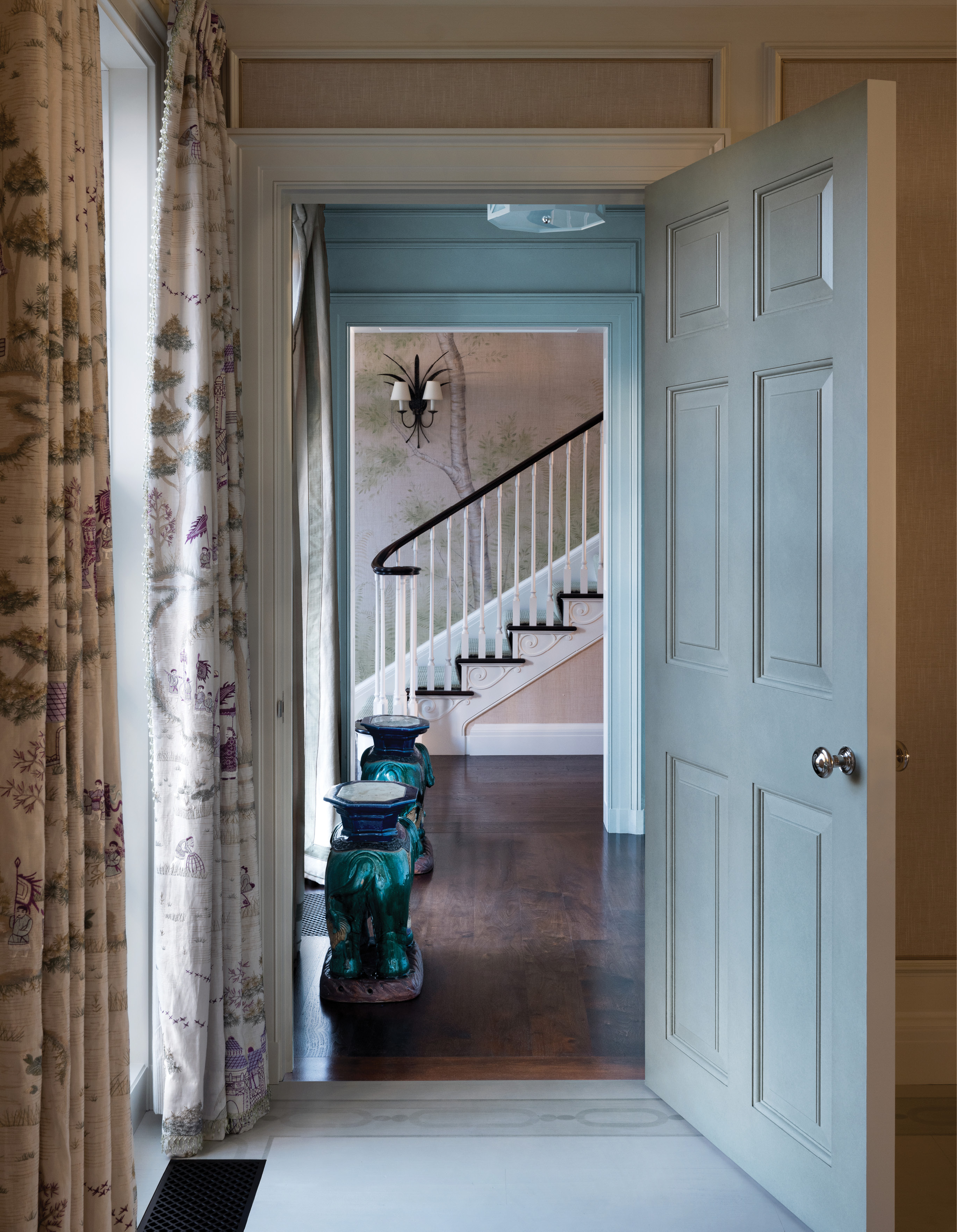 Photography by Paul Raeside A view through to the stairwell designed by Nina Campbell